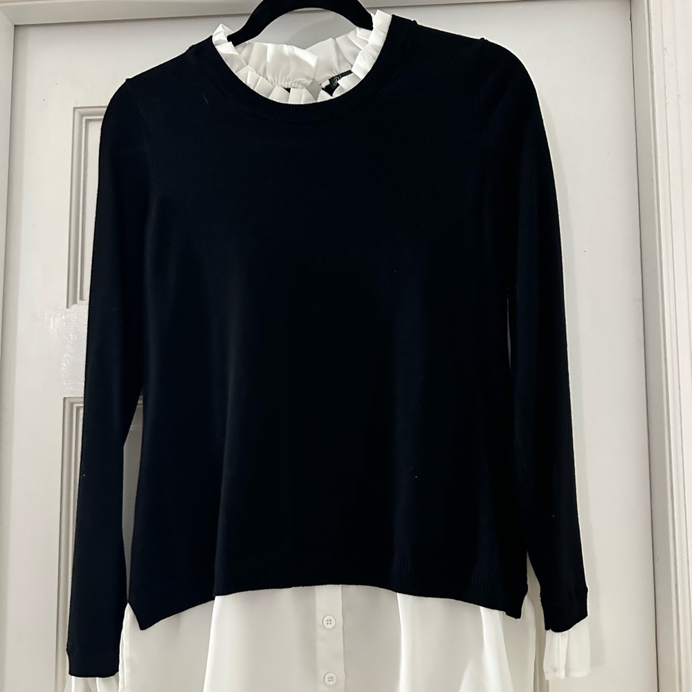 Layered look sweater.  Excellent color condition